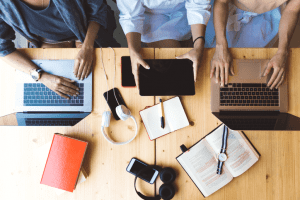 People using computers at a desk