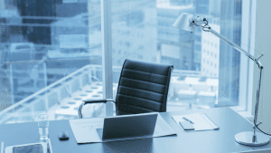 empty chair at a desk in an office