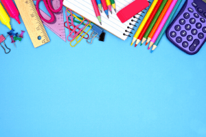 Arts and crafts supplies on a blue table