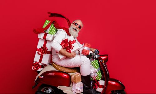 guy on scooter w presents
