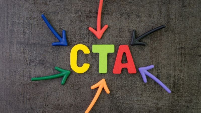 the letters cta on a grey background with multicolored arrows pointing to them