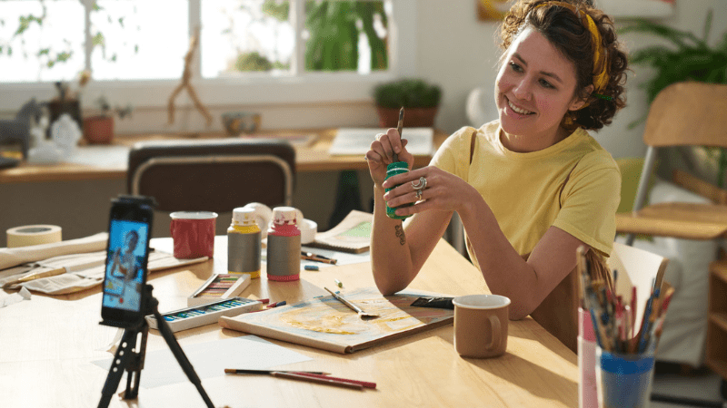 woman filming a ugc video about paint